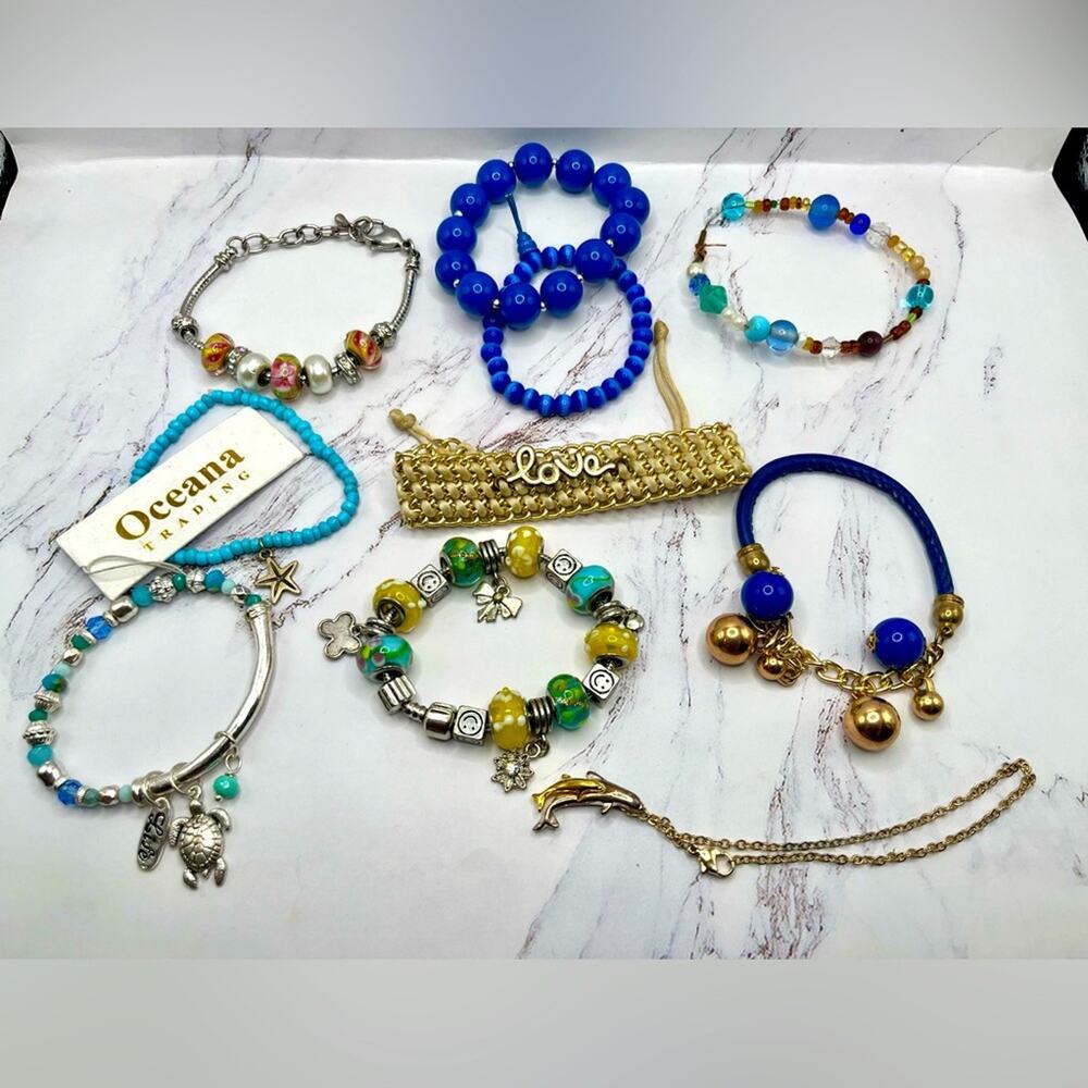 Bracelet lot, blue with nautical theme, charms, and others
